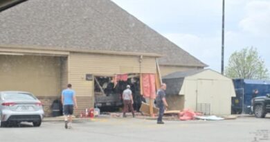 Vehicle Crashes Through Side Of Travel Center